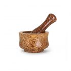 Solid coconut mortar and pestle with a polished shine