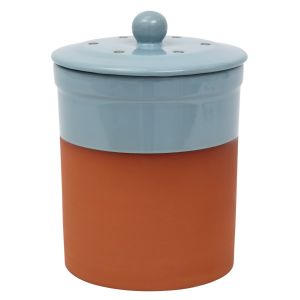 Terracotta pot with a glazed blue top and lid, used for kitchen food waste