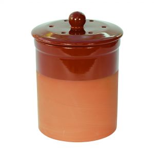 Orange and red terracotta pot for food waste in the kitchen