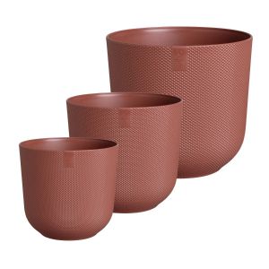 set of three different sized plastic plant pots, in terracotta red with a textured finish