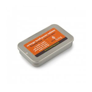 metal tin of orange flavoured toothpaste tablets which are vegan and plastic free