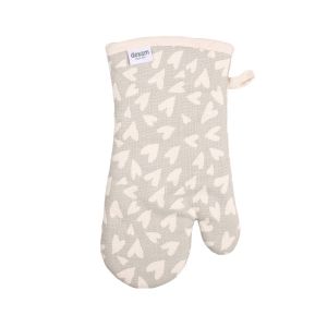 Single oven glove made from organic cotton, in a light grey colour with cream heart print. The kitchen gauntlet features a bound edge and hanging loop for easy storage