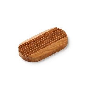 a small oval shaped soap dish with water draining grooves, made from olive wood