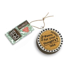 Small round coin-shaped dog chew toy made from eco-friendly materials