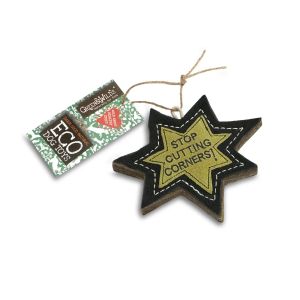 Spiky star shaped dog chew toy with text 'stop cutting corners'